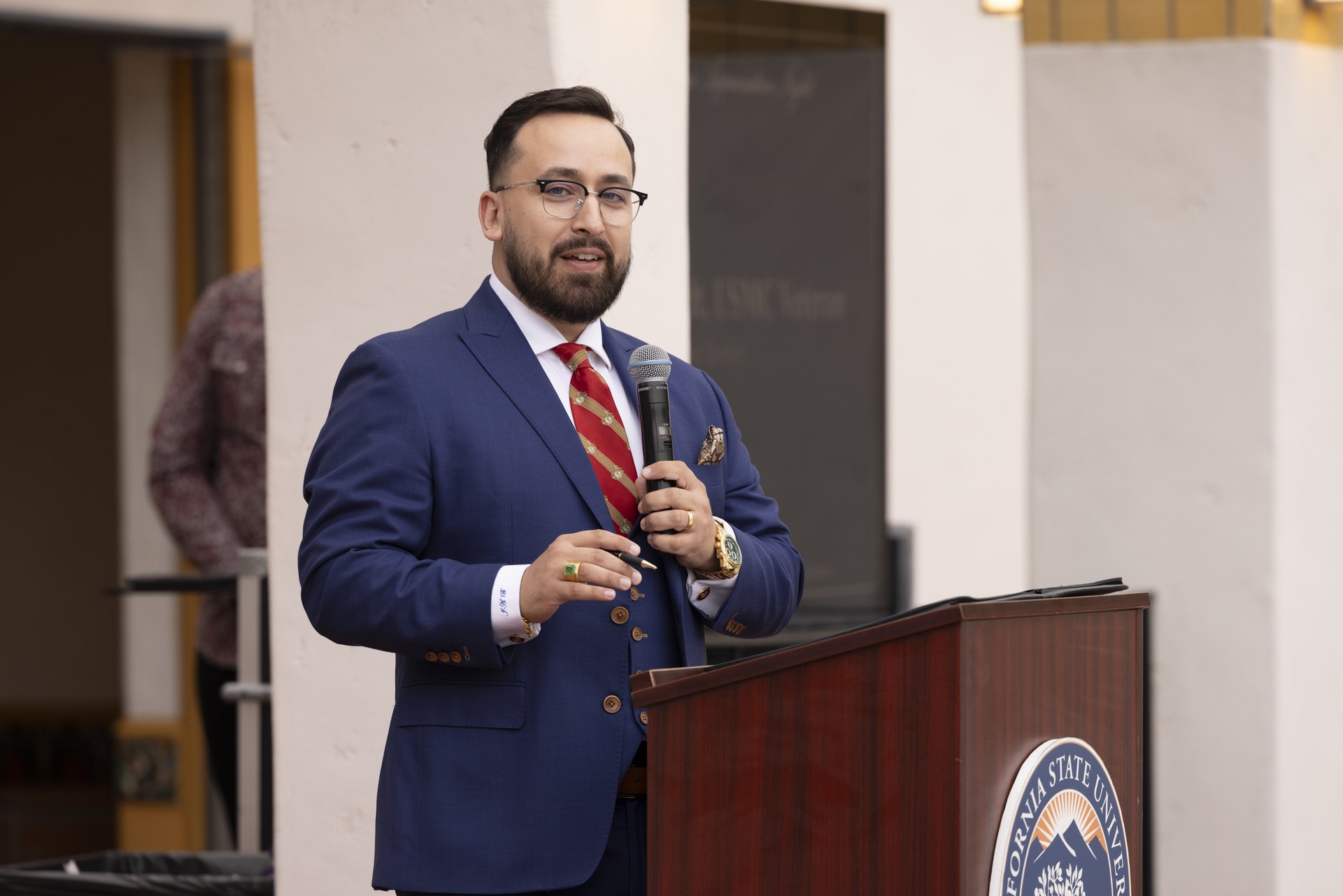 James Burandt speaking at a podium